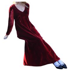 This romantic vintage red velvet dress was custom-made in the late 1930s (possibly early 1940s), and is entirely one-of-a-kind. The maxi-length crushed red velvet is so rich. It features a gathered empire waist, with long tailored sleeves that come to a point at the cuff. It was reworked and modernized around the 1970s, with a zipper added in the back, making it easier to wear. Because of the empire waist, this can also be an incredible vintage maternity dress. Closes in the back with a zipper. Red Floor-length Velvet Dress, Vintage Maternity, Red Velvet Dress, Vintage Long Sleeve, Vestidos Vintage, Heart Locket, Maternity Dress, Velvet Dress, New Vintage