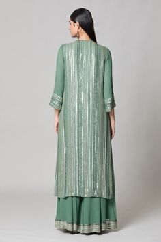 Forest green straight kurta with linear pattern sequin embroidery. Comes with embroidered hem palazzo and striped sequin sheeted dupatta. - Aza Fashions Green Sequined Straight Kurta, Festive Green Sequined Kurta, Kurta Palazzo Set, Embroidered Hem, Women Kurta, Palazzo Set, Sequin Embroidery, Linear Pattern, Straight Kurta