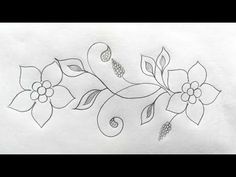 a drawing of flowers with leaves and swirls on the side of a sheet of paper