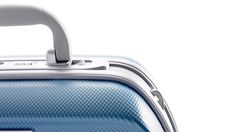 a close up of a blue suitcase on a white background with the handle pointing upward