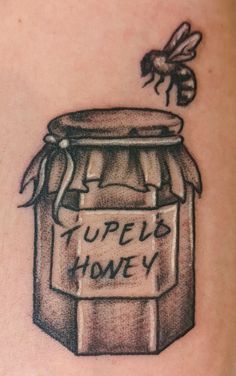 black and grey tattoo
tupelo honey jar and honey bee
[FRESH]
Husband's handwriting. Ode to our first dance Tupelo Honey by Van Morrison Honey Bear Bottle Tattoo, Honey Jar Tattoo Ideas, Honey Jar Tattoo, Honey Jar Drawing, Honey Jar Sketch, Honey Tattoo