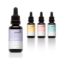 three bottles of sleep oil and one bottle of liquid with the same label on it