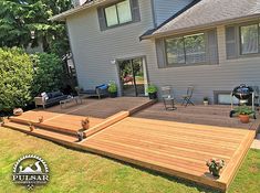 a large deck in front of a house