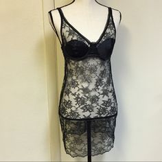 This Is An Unworn Vintage Piece. Victoria’s Secret Underwire, Satin, And Lace Chemise Negligee. Adjustable Straps, Hook And Eye Back Closure. Unlined Cups. Low Dip Back. Thank You For Looking, And .... Happy Poshing!! Fitted Sheer Camisole Chemise, Fitted Sheer Chemise Camisole, Sheer Fitted Chemise For Night, Elegant Fitted Black Chemise, Victoria's Secret Elegant Sleepwear With Built-in Bra, Elegant Victoria's Secret Sleepwear With Built-in Bra, Fitted Chemise With Built-in Bra For Night Out, Fitted Black Chemise, Black Fitted Chemise