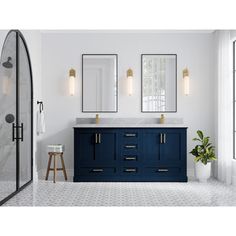 a bathroom with two mirrors and blue cabinets