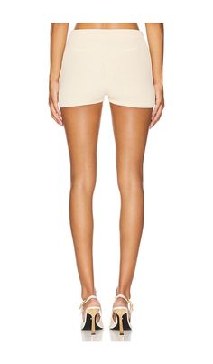 Find AYA MUSE Lysi Shorts In Beige on Editorialist. Aya Muse Lysi Shorts in Beige. - size L (also in M, S, XL, XS, XXS) Aya Muse Lysi Shorts in Beige. - size L (also in M, S, XL, XS, XXS) 69% cotton 30% polyamide 1% spandex. Made in China. Machine wash. Zip fly and button closure. Faux pocket design. Slinky knit fabric. Item not sold as set. Shorts measure approx 11 in length. AYAR-WF2. AMPF2422. Ethical and entirely unique, Los Angeles based label Aya Muse offers sustainable collections that se Beige Short Lounge Pants, Beige Loungewear Shorts, Beige Stretch Short Length Pants, Fitted Beige Shorts With Elastic Waistband, Beige Short Bottoms For Loungewear, Beige Lounge Shorts, Beige Fitted Shorts For Loungewear, Beige Short Loungewear Bottoms, Short Beige Bottoms For Loungewear