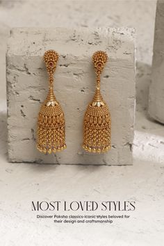 The intricate floral design and elongated cylindrical shape come together in perfect harmony, showcasing artisanal mastery. Crafted from 925 silver, these jhumkas exude elegance with a contemporary twist. Don't miss our exciting offer – enjoy a remarkable 10% discount using code BEST10. Indian Gold Earrings Teardrop, Gold Jhumka Earrings Temple Jewelry, Luxury 22k Gold Jhumkas With Tilla, Luxury Filigree Earrings For Diwali, Luxury Formal Drop Chandbalis, Luxury Gold Earrings With Latkans, Luxury Gold Jhumkas For Ceremonial Occasions, Luxury Gold Plated Earrings For Diwali, Luxury Gold Round Jhumkas