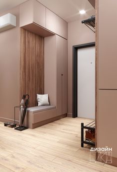 a room with wooden floors and pink walls