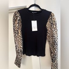 Zara Black / Cheetah Blouse. Nwt Never Worn. Trendy Tiger Print Tops For Fall, Chic Leopard Print Top For Party, Chic Leopard Print Party Top, Trendy Leopard Print Tops For Night Out, Fitted Black Top With Tiger Print, Fitted Black Tiger Print Top, Fall Tiger Print Tops, Chic Leopard Print Long Sleeve Tops, Chic Leopard Print Tops For Night Out