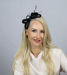 Black modest fascinator with few feathers and net. Minimalist black fascinator from black silk fabric. Elegant and decent size fasciantor for ladies, who want to a small accent and put a dot to their outfit. You can wear this fascinator in very many different occasions and places: birthdays, theathre or concerts, anniversaries, weddings, church, cocktail parties etc. Light in weight and easy to take with you when you are travelling. *Like this style, but need in other color? Please write me abou Elegant Black Fascinator For Evening, Black Formal Fascinator For Royal Ascot, Black Fascinator For Evening, Chic Black Fascinator For Evening, Elegant Black Fascinator For Events, Chic Evening Mini Hats With Feathers, Chic Black Fascinator For Events, Formal Feather Trim Headpieces, Elegant Black Fascinator For Royal Ascot