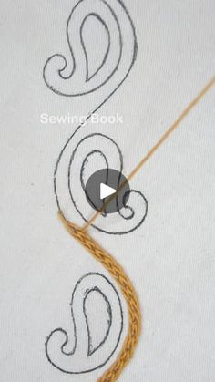 the video shows how to do an embroidery work on a t - shirt with thread