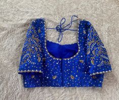 Hand embroidered ready made saree blouse / crop top/stitched saree blouse usa / blue  saree blouse/ hand embroidered blouse/zardosi blouse/orange saree blouse/ blue pure silk blouse/ maggam work blouse        It is very true that a perfect blouse is the one which makes your saree look stand out !! If you find one of such a style that you have been wanting to have then dont let it go !! we carry such unique trending blouses that instantly add a stylish look to any saree !!     Well..!! we underst Full Maggam Work Blouse Designs, Zardosi Blouse, Embroidery Blouse Saree, Hand Embroidery Blouse, Ready Made Blouse, Maggam Blouse, Stitched Saree, Blouse Crop, Orange Saree