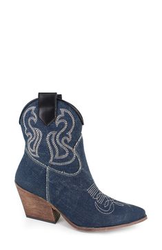 Decorative stitching and side pull-tabs lend Western-inspired elements to a trend-savvy bootie balanced by a pointy toe and block heel. 2 1/2" heel 5 1/2" shaft Leather or textile upper/leather lining and sole Made in Italy Blue Snip Toe Heeled Boots For Fall, Trendy Dark Wash Boots For Fall, Western Denim Blue Boots For Fall, Western Style Denim Blue Boots For Fall, Dark Wash Denim Boots With Round Toe, Western Style Denim Blue Boots With Round Toe, Denim Ankle Boots For Fall, Fall Medium Wash Denim Boots, Denim Blue Western Boots For Fall