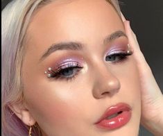 Festival Jewels Face, Purple Jewel Makeup, Festival Makeup Pearls, Speak Now Era Makeup Looks, Face Jewels Taylor Swift Concert, Simple Makeup Looks With Pearls, Pink Gems Makeup, Purple Makeup With Pearls, Pink And Pearls Makeup