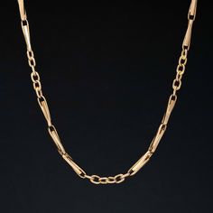 Another chain with beautiful links and understated style. Perfect length for hanging one's pendant or charms on. Super chic! 18kt yellow gold 19" in length 19.3 grams Formal Gold Chain Necklace With Rectangular Links, Formal Delicate Chain Necklace With Oval Link, Formal Delicate Link Chain Necklace, Formal 14k Gold Link Chain Necklace, Formal Delicate Chain Necklace, Classic Gold Chain Necklaces With Rectangular Links, Gold Chain Necklace With Rectangular Links, Yellow Gold Link Chain Necklace, Timeless Figaro Chain Link Necklace