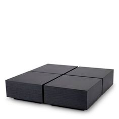 three black boxes sitting on top of each other