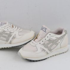 Nos Vintage 90s Asics Womens 7 Spell Out Leather Sneaker Shoes White Unwearable Shoes Never Worn Without Box. Unwearable With Some Yellowing. Cannot Be Worn Meaning If You Wear Them They Will Rip Apart. Collectors Only Womens Size 7 Check Out My Other Items In My Store Vogue Squared! Shoerack Retro Asics Lace-up Sneakers, Vintage Synthetic Sneakers For Sports, Vintage Synthetic Sports Sneakers, Vintage Style Synthetic Sports Sneakers, Vintage Lace-up Synthetic Sneakers, Asics Shoes, Asics Women, Sneaker Shoes, Shoes White