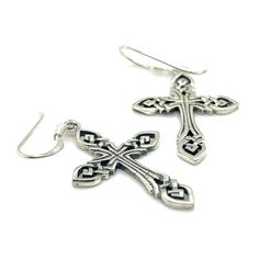 A pair of Super Silver Celtic Knot Cross Earrings, symbolizing eternity, on a white background. Celtic Knot Cross, Cross Earrings, Weaving Patterns, Earring Sale, The Divine, Celtic Knot, Essence, Weaving, 925 Sterling Silver