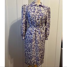 This Vintage Purple Dress Is Trendy. Has A Abstract Print With A Polkadot Shiny Overlay Cuff Link, Shoulder Padding, Shiny Button Design, Side Pockets And Lined Collar. Measured Laying Flat Shoulder To Shoulder: 16” Sleeve Length: 22” Bust: 40” Waist: 40” Hips: 39” Hem: 38” Length: 42” *100% Silk Glamourrust Sells Brand New And Pre-Owned Apparel And Vintage Fashion Items. The Products I Offer Were Previously Available For Sale In A Retail Environment And Exposed To Appreciable Customer Contact S Purple Spring Dress With Button Closure, Spring Purple Dress With Button Closure, Spring Purple Dresses With Button Closure, Purple Button-up Spring Dress, Purple Button-up Dress For Spring, Purple Button-up Daywear Dress, Purple Button-up Dress For Daywear, Elegant Purple Dress With Button Closure, Formal Purple Dress With Buttons