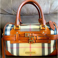 Authentic Burberry Alchester Bridle Bowling Bag, House Check Canvas, Medium Sized (30cm) Similar To Speedy 30. Light Surface Scratches Throughout And Minor Tarnish On Hardware. Adjustable Strap Included. No Odor, Rips Or Stains Designer Handheld Satchel For Travel, Designer Handheld Satchel With Leather Handles, Bag House, Bowling Bag, Bowling Bags, Speedy 30, Burberry Bag, Bowling, Medium Size