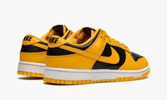 The Nike Dunk Low “Goldenrod” is an original colorway of the classic low-top shoe that debuted back in 1985 as part of the college basketball-inspired “Be True to Your School” collection.  Also known as the “Varsity Maize” and “Iowa” Dunk Low, the “Goldenrod” is a timeless, two-tone, black and yellow colorway of the vintage basketball shoe that also inspired the coveted, unreleased “Wu-Tang” Dunk High from 1999.  Here, the “Goldenrod” features black leather on the perforated toe and on the mid-p Throwback Custom Sneakers For Streetwear With Rubber Sole, Throwback Streetwear Custom Sneakers With Rubber Sole, Yellow High-top Sneakers With Rubber Waffle Outsoles For Streetwear, Streetwear Low-top Basketball Shoes With Gum Sole, Low-top Basketball Shoes With Gum Sole For Streetwear, Classic Basketball Shoes With Gum Sole For Streetwear, Retro Basketball Shoes With Contrast Sole For Streetwear, Classic Low-top Basketball Shoes With Gum Sole, Classic Low-top Custom Sneakers For Streetwear