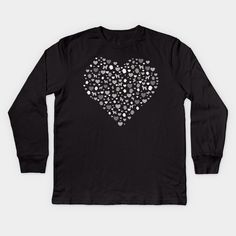 a black shirt with silver hearts in the shape of a heart on it's chest