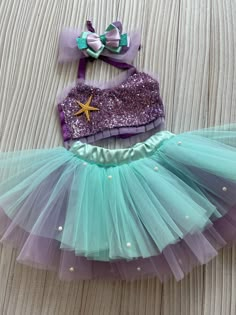 ⭐⭐Toddler Mermaid Inspired Purple Costume,Baby Girl Mermaid Outfit,Mermaid Tutu Romper,1st Birthday costume with Sequin Top,Cake Smash Outfit⭐⭐ 👉 Our costume is our own handmade product. The upper part of the costume is made of sequin fabric and the skirt part is made of tulle. Mermaid costume will make girls' colorful worlds even more colorful. You too can contribute to our costume design and make the mermaid costume even more unique. We welcome you to contact us for any suggestions, comments Ariel The Little Mermaid Tutu, Mermaid Infant Costume, Mermaid Costume Mommy And Me, Baby Mermaid Costumes, Purple Costume, Mermaid Tutu, Birthday Costume, Mermaid Outfit, Purple Mermaid