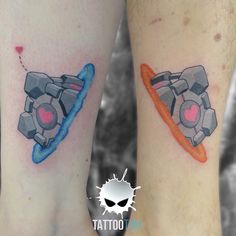 Gamer Matching Tattoos, Couples Arm Tattoos, Matching Tattoos Couples Gaming, Lego Tattoo Couple, Companion Cube Tattoo, Portal Game Tattoo Ideas, Gaming Couple Tattoos, Couple Tattoos Video Game, Duo Tattoos