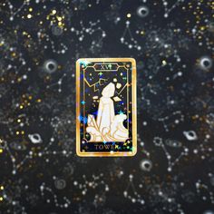 a dog sitting on top of a black surface with stars and sparkles around it