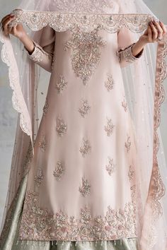 The embellished Nikkah Dress in Lehenga Kameez Style is an elegant masterpiece adorned with Hand-crafted details of Zardosi and Crystals. Fast shipping. Pink Kameez, Royal Lehenga, Lehenga Kameez, Kameez Style, Bracelet Embroidery, Chic Prom Dresses, Pakistani Bridal Dress, Nikkah Dress, Fancy Sarees Party Wear