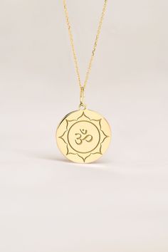 Om represents yoga, spirituality, and peace in body, in mid and spirit. This pendant is a meaningful gift for Birthdays, Anniversaries and Weddings. ● 14K SOLID GOLD ● FREE BACK SIDE PERSONALIZATION ● FREE SHIPPING  ● Inner diameter of the jump ring is 4mm ● Pendant thickness is 0.5mm 🇺🇸 All items are HANDMADE IN USA 🇺🇸 All materials are sourced from USA ● Chain Length Options    - Without Chain    - 40 cm / 16 inches    - 45 cm / 18 inches    - 50 cm / 20 inches ● Pendant Size Options    - Spiritual Round Pendant Charm Necklace For Healing, Spiritual Healing Charm Necklaces With Round Pendant, Adjustable Spiritual Charm Necklace In Yellow Gold, Spiritual Healing Charm Necklace With Round Pendant, Holistic Handmade Jewelry For Yoga, Spiritual Round Necklace, Cadmium-free, Spiritual Personalized Medallion Charm Necklaces, Spiritual Personalized Medallion Charm Necklace, Engraved Symbolic Necklace For Meditation