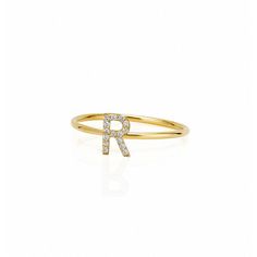 Whether you choose an initial just for her or multiple initials to represent family and children, these delicate rings can be worn alone or stacked together. Made from 14kt yellow gold, each ring is handcrafted in NYC by renowned jewelry designer, Sarah Chloe.    Available in ring size 6 or 7  Initial: 0.3" h  14kt yellow gold and optional  See Product Information for more details.  Imported  Monogramming is foil debossed. 14k Gold Stackable Rings With Initials, Stackable Initial Ring In Yellow Gold And Sterling Silver, Stackable Sterling Silver Initial Ring In Yellow Gold, Yellow Gold Stackable Initial Ring In Sterling Silver, Yellow Gold Sterling Silver Stackable Initial Ring, Gold Sterling Silver Stackable Rings With Initials, Dainty 14k Gold Stackable Rings With Initials, 14k Gold Stackable Rings With Initials For Anniversary, Yellow Gold Stackable Promise Rings With Initials