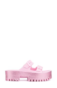 With a cushy insole, this casual slide sandal offers lasting comfort to be a weekend wardrobe favorite. 4 1/2" heel Synthetic upper and lining/rubber sole Imported Pink Adjustable Synthetic Slides, Trendy Synthetic Flip Flops With Buckle Closure, Pink Synthetic Slides With Textured Footbed, Synthetic Slide Flip Flops With Buckle Closure, Synthetic Slip-on Slides With Buckle Closure, Synthetic Buckle Closure Slip-on Slides, Pink Synthetic Footbed Sandals With Buckle Closure, Pink Synthetic Jelly Sandals With Cushioned Footbed, Pink Synthetic Footbed Sandals For Spring