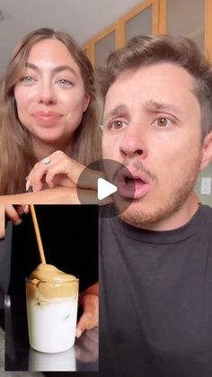 a man and woman making funny faces while drinking milk from a glass with a straw in it