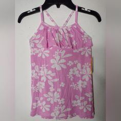 Add A Touch Of Elegance To Your Little Girl's Wardrobe With This Brand New Rumi + Ryder Top. Featuring A Delightful Floral Pattern In Shades Of Pink And White, This Sleeveless Top Is Perfect For Casual Occasions. Made For Girls, This Will Make A Wonderful Addition To Your Child's Wardrobe. Fitted Printed Tops For Playwear, Printed Tops For Summer Playwear, Printed Tops For Playwear In Summer, Playful White Tops For Beach, Cotton Floral Print Tops For Playwear, White Printed Top For Playwear, White Fitted Playwear Tops, White Sleeveless Tops For Playwear, Floral Print Cute Playwear Tops