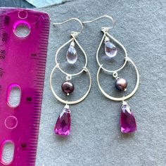 Lightweight sterling silver double hoops show off pink amethyst ( it's a lavender color) pearls and magenta trillions! Please note that leverbacks are an upgrade. IF no earwires are chosen from the dropdown menu, the French ball earwires shown here will be sent. The approximate length is 3” Your jewelry will arrive beautifully giftboxed. Elegant Small Hoop Purple Earrings, Elegant Purple Small Hoop Earrings, Modern Purple Dangle Jewelry, Modern Pink Teardrop Jewelry, Double Hoop Earrings, Pink Amethyst, Lavender Color, Piercings, Amethyst