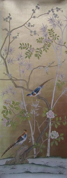 two birds are perched on the branches of a tree in front of a wall mural