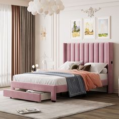 a bedroom with a pink headboard and bed in the middle, surrounded by pictures on the wall