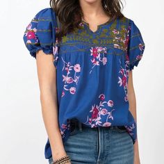 Ivy Jane Nwt Sister Mary Patsy Boho Embroidered Floral Smock Sleeve Peasant Top Look No Further, This Stunning Ivy Jane Top Is A Must-Have In Your Wardrobe. Crafted With A Beautiful Embroidered And Floral Design With Smock Sleeves, This Peasant Top Gives You A Boho Chic Look. Featuring An Nwt Sister Mary Patsy Label For Brilliantly Simple Styling, This Top Looks Right At Home With Your Favorite Pair Of Jeans. Get Ready To Turn Heads With This Exquisite Piece! - Ivy Jane - Nwt Sister Mary Patsy - Boho Embroidered Floral - Smock Sleeve Peasant Top - Size: Xs Measurements (Approximate & Unstretched) P2p: 20” Sleeve: 10” Length: 27” Location: Rrr-6 #Bohofashion #Ivyjan Blue Peasant V-neck Top, Blue Peasant Style V-neck Top, Blue Folk Top For Spring, Blue Folk Style Top For Spring, Vacation Blue Floral Print Peasant Top, Blue V-neck Peasant Top With Floral Print, Blue V-neck Peasant Top With Boho Print, Vacation Blue Floral Peasant Top, Blue Floral Print Embroidered Top