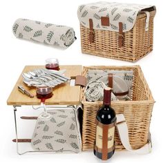 two wicker picnic baskets with bottles of wine and utensils on the table