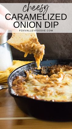 someone is dipping cheese onto an omelette in a skillet