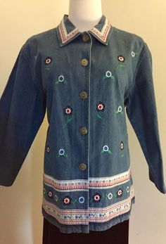 "Beautiful vintage embroidered and embellished garden jacket, beautiful ribbon embellishments at the collar and bottom, floral embroidery and appliqué , 5 metal ornate buttons, soft stonewashed denim, 3/4 length sleeves, slight flare at the bottom, great as an evening, porch, garden or boating jacket Bobbie Brooks Brand Size Large 12-14 Excellent vintage condition Like New Measures when laid flat  Chest 22\" (44) Length 28\" Sleeve 19\" Back Shoulder 18\" Smoke free studio" Salvage Denim, Ribbon Embellishments, Blue Jean Vest, Bobbie Brooks, Porch Garden, Denim Pocket, Embellished Denim, Jacket Vintage, Vintage Fabrics