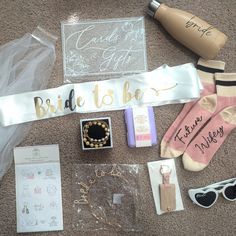 the contents of a bridal to be bag laid out on the floor