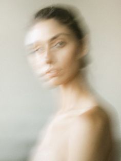 a blurry photo of a woman's face