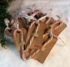 some candy canes are wrapped in brown paper