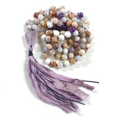 "CALM YOU FEARS - Crazy Lace Agate Mala With Amethyst - Knotted Mala Beads - 108 Bead Mala - 8mm Bead Size - Length Approx. 39\" - 6mm Length Approxl. 30\" When it comes to clarity and focus, this lovely Amethyst and Agate Mala necklace is a wonderful choice for daily wear or for your meditation practice. Artistically designed, it features a display of Brown and Cream Crazy Lace Agate a stone known for grounding and centering and its ability to improve mental concentration, accented with Amethys Hand-strung Purple Bohemian Beads, Bohemian Hand-strung Purple Beads, Purple Hand-strung Bohemian Beads, Purple Bohemian Hand-strung Beads, Bohemian Lavender Hand-strung Jewelry, Adjustable Hand-strung Agate Mala, Adjustable Agate Hand-strung Mala, Bohemian Agate Mala With Gemstone Beads, Bohemian Agate Mala With Round Beads