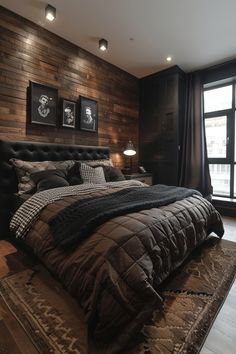 a large bed sitting in the middle of a bedroom next to a tall wooden wall