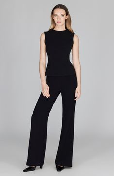 A classic wide leg pant with all the right details. Cut in a comfortable and luxurious Italian double face fabric, this full length pant has a beautiful drape and weight and is finished with a simple back zip to maintain a clean front. NOTE: This pant runs generously and most people have sized down from their typical Mi Jong Lee pant size. Elegant Stretch Elastane Pantsuit, Classic Wide Leg Pantsuit For Evening, Classic Wide Leg Evening Pantsuit, Elegant Stretch Wide Leg Full-length Pants, Elegant Stretch Wide Leg Full Length Pants, Elegant Wide Leg Stretch Pants, Classic Wide-leg Evening Pantsuit, Elegant Stretch Wide Leg Pants For Evening, Elegant Full-length Stretch Wide Leg Pants