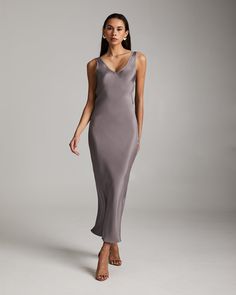 Bias cut silk crepe slip elegantly drapes on the body. Featuring an elongating V Neck at the front and back. 100% silk crepe Model is 5'10" and wearing a size S Product Care: Dry Clean Only Pre-draped Silk Slip Dress For Gala, Elegant V-neck Slip Dress For Formal Occasions, Sleek Silk Dress With Satin Finish And V-neck, V-neck Bias Cut Slip Dress For Gala, Sleek Silk V-neck Dress For Formal Occasions, Bias Cut V-neck Slip Dress For Gala, Fitted Silk Dress With Satin Finish And V-neck, Elegant V-neck Slip Dress With Back Opening, Pre-draped Silk Midi Dress With Bias Cut