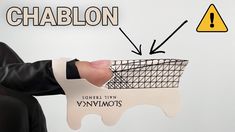 a person in a suit holding a paper basket with the words chablon on it